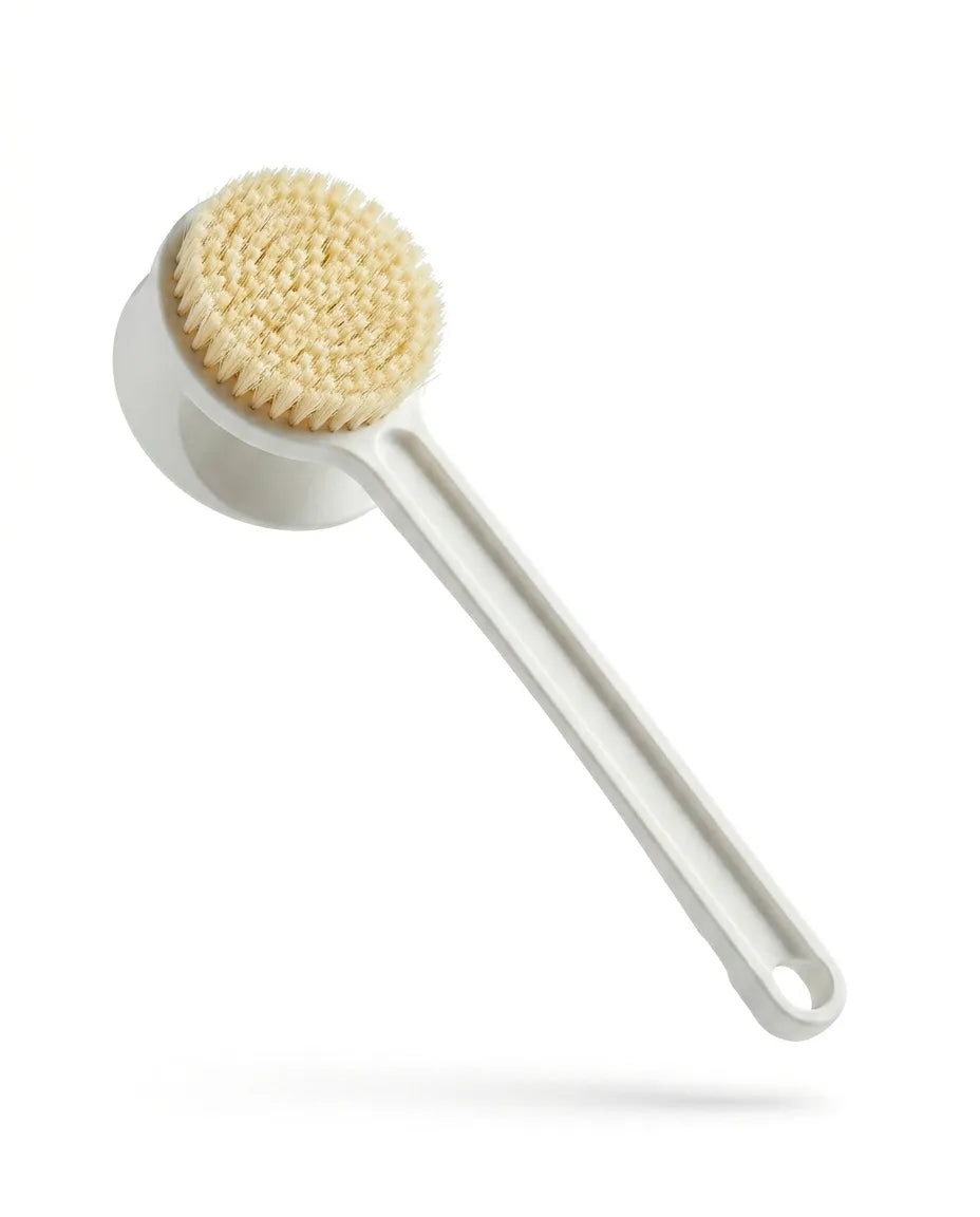 A soft-bristle body brush with a long handle for at-home exfoliation.
