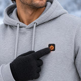 Uppvärmd hoodie PyreFit Velocor, kontrollknappen i närbild